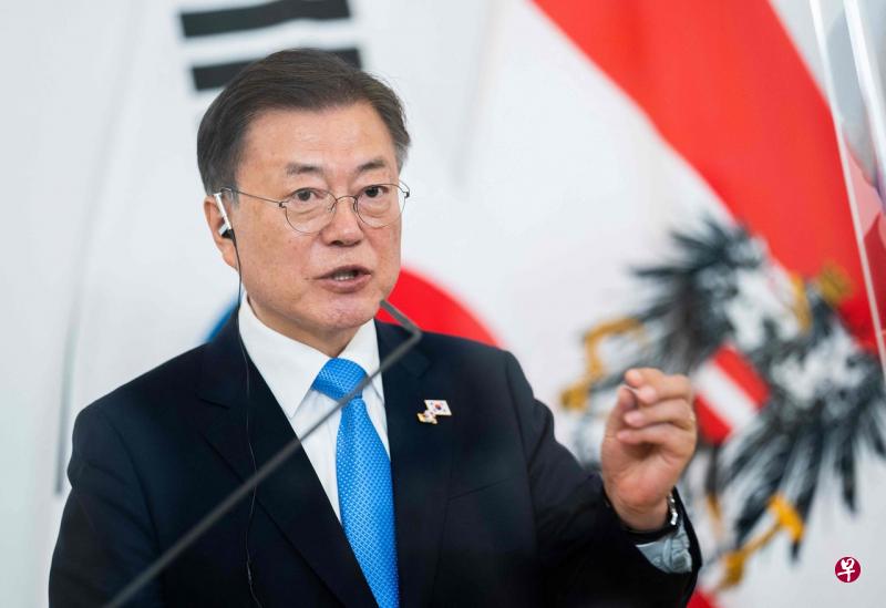 韩国总统文在寅说，本周末是疫情扩散的紧要关头，希望全民尽量避免出行和外出，配合疫情防控。（法新社） 