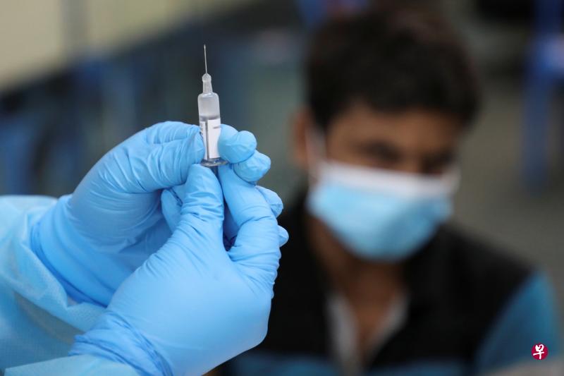 马国有望提前达到80%成人完成接种疫苗的目标。（路透社） 
