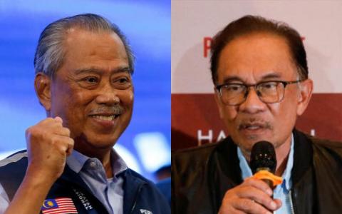 国民联盟主席慕尤丁（左）和希望联盟主席安华，谁会成为马来西亚下一任首相？（路透社）