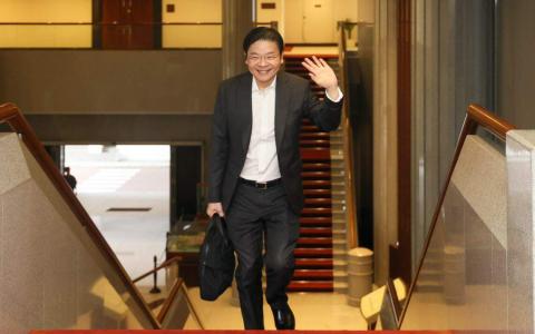 副总理兼财政部长黄循财在正月初七人日，发表题为“齐心协力，共创未来”的2024年财政预算案声明。（卓祾祎摄）