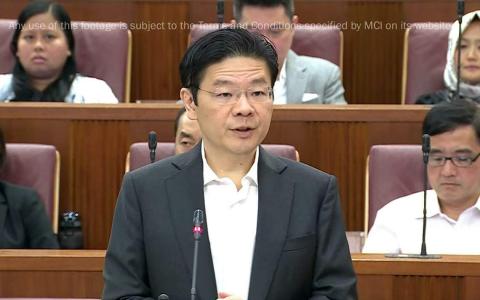 副总理兼财政部长黄循财分析，接下来政府支出占国内生产总值的比率会增加，上世纪八九十年代那样的政府结构性财政盈余不会重现。（gov.sg视频截图）