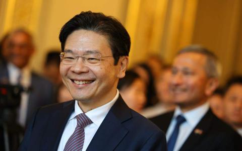 副总理兼财政部长黄循财吁请每个国人与他同行，分享点子、热忱和梦想，与他和他的团队共同塑造让每个新加坡人都发光发热的光明未来。（何家俊摄）