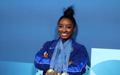 美国体操女王西蒙妮在本届奥运会夺得三金一银。（路透社）