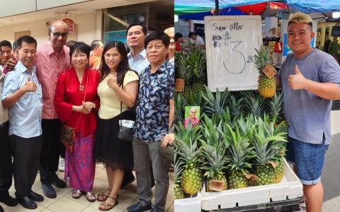 尚达曼（左图左二）9月2日携妻子珍一藤木到大巴窑谢票；右图为全岛经营20多家连锁水果摊的“Singapore Durian Boy”负责人陈东山。（受访者提供）