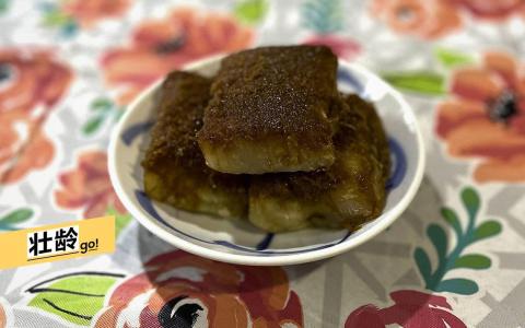 满满椰丝的蒸木薯糕。 （黄靖晶摄）