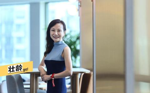 郭令明办公室秘书长吴冠英博士总在不断学习新事物，并乐在其中。（陈渊庄摄）