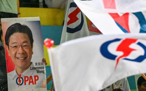 竞逐所有97个议席的人民行动党，总开销为940万3807元，是所有政党中最高的，也比2020年增加36.1％。（法新社）