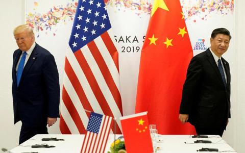 2019年6月29日，美国总统特朗普在日本大阪举行的二十国集团（G20）领导人峰会上，与中国国家主席习近平举行双边会晤。（路透社档案照片）