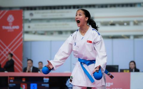 玛丽莎的怒吼，不仅喊出自己的胜利，也宣告新加坡空手道在东运格斗场上强势归来。（海峡时报）