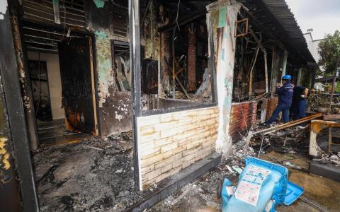 如切一排锌板屋起火一人送院 火势或从无人机店烧起