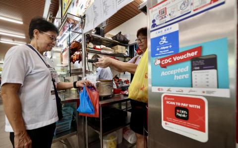 邻里购物券年底到期 消费者加紧消费商家受益