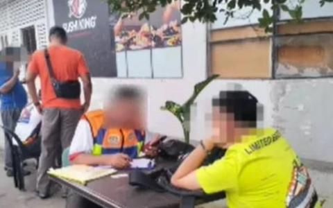 两新加坡人新山乱丢垃圾接罚单 另有狮城车主疑非法添油受查