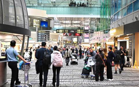 我国密切关注立百病毒传播 机场加强旅客体温筛查