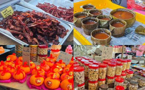 马国市集年货琳琅满目，既有供应商货品，也有住家自制，选择丰富。（陈爱薇摄）