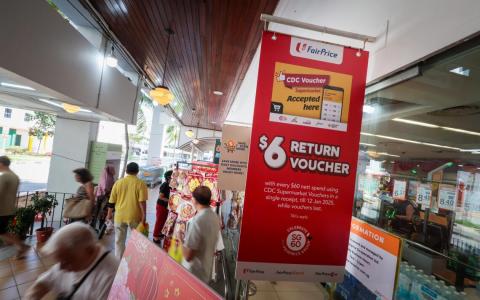 何礼娜建议 邻里购物券按人头派发并扩大使用范围