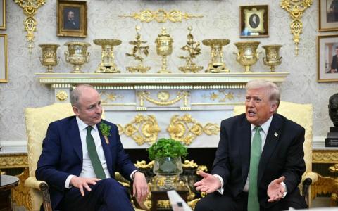 特朗普会见爱尔兰总理马丁（左）时，声称美国多年来在北约投入“数万亿美元”，这是美国出现财政赤字的原因之一。（法新社）