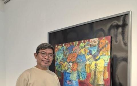TUJU艺术团体其中一名会员拉姆利·纳维（Ramli Nawee，也称Ramlin）展出混合媒介作品。（TUJU艺术团体提供）