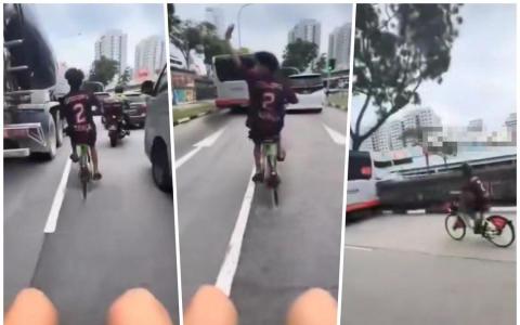 三名青少年分别骑着两辆共享脚踏车，在车流中相互追逐。过程中，三人不断嬉笑、高喊，危险行为令人捏一把冷汗。（Telegram视频截图）