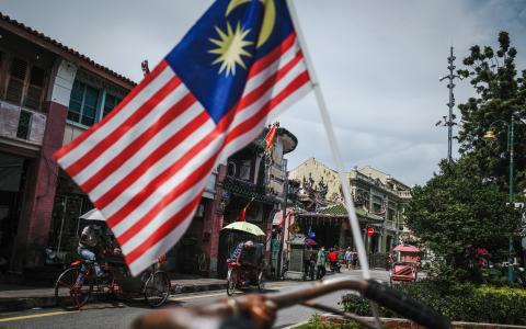 马来西亚希盟与国阵已就组织团结政府达致10点协议，包括由希盟代表出任首相，国阵代表出任副首相。（叶振忠摄）