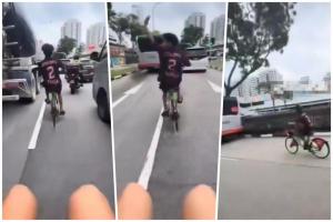 三名青少年分别骑着两辆共享脚踏车，在车流中相互追逐。过程中，三人不断嬉笑、高喊，危险行为令人捏一把冷汗。（Telegram视频截图）