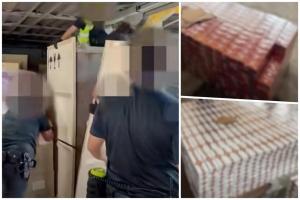 执法人员检查车辆后，在数个置于铁柜内的货箱中，起获超过1万2800条漏税香烟。（取自移民与关卡局脸书视频截图）