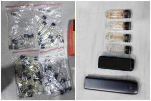 根据控状，被告涉嫌在后港中路第852座九楼一个单位，持有51个装有液体的烟弹，液体相信含有被列为特定化合致幻药的依托咪酯，且持有目的是在新加坡出售。（卫生科学局提供）